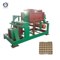 Papierpulp eiertray die machine maakt